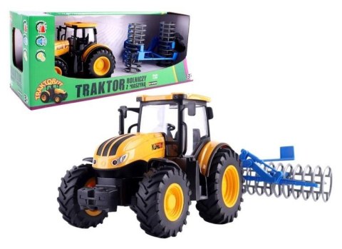 Traktor rolniczy z broną talerzową Traktor rolniczy z broną talerzową