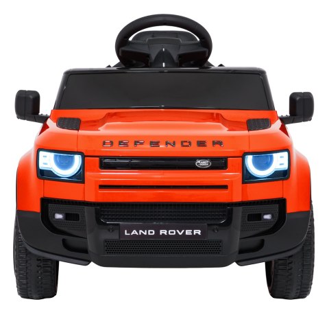 Auto Land Rover Defender pomarańczowe na akumulator dla dzieci + pilot R/C