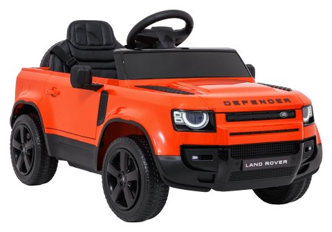 Auto Land Rover Defender pomarańczowe na akumulator dla dzieci + pilot R/C