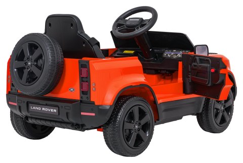 Auto Land Rover Defender pomarańczowe na akumulator dla dzieci + pilot R/C