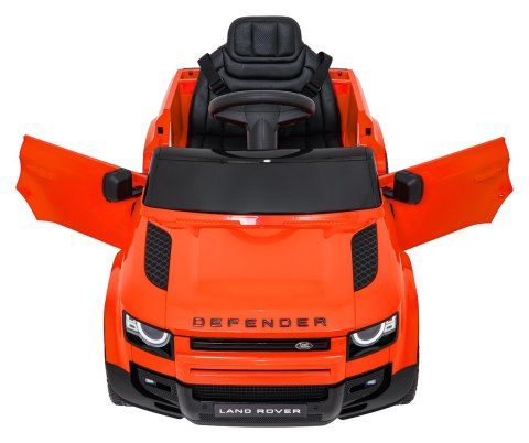 Auto Land Rover Defender pomarańczowe na akumulator dla dzieci + pilot R/C