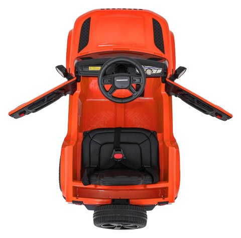 Auto Land Rover Defender pomarańczowe na akumulator dla dzieci + pilot R/C