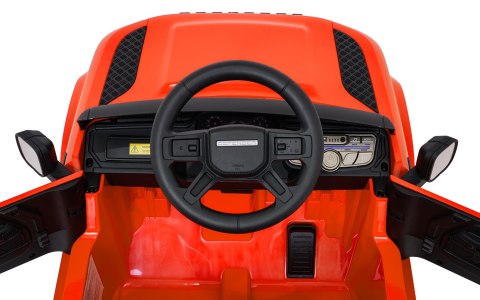 Auto Land Rover Defender pomarańczowe na akumulator dla dzieci + pilot R/C