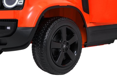 Auto Land Rover Defender pomarańczowe na akumulator dla dzieci + pilot R/C