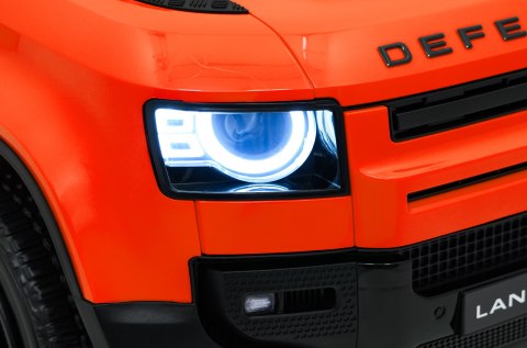 Auto Land Rover Defender pomarańczowe na akumulator dla dzieci + pilot R/C