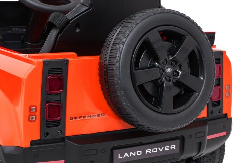 Auto Land Rover Defender pomarańczowe na akumulator dla dzieci + pilot R/C